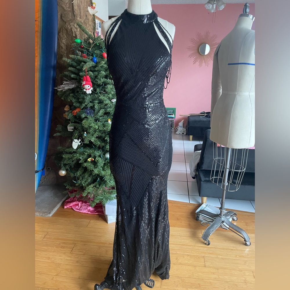 Sequin floor length gown with beaded sleeves